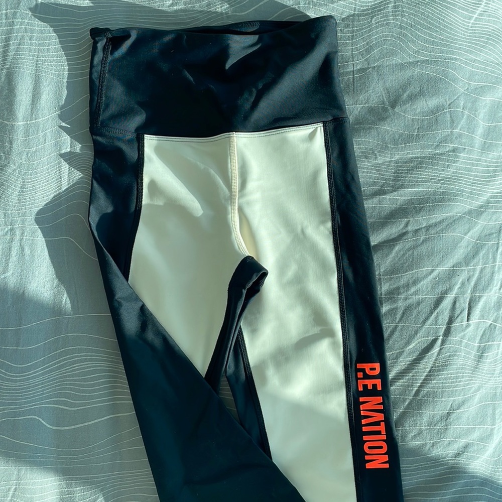 I am selling brand new p.e nation leggings in size 2xs